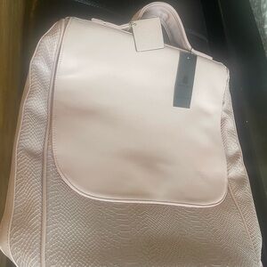 Light Pink “Tote and Carry” backpack